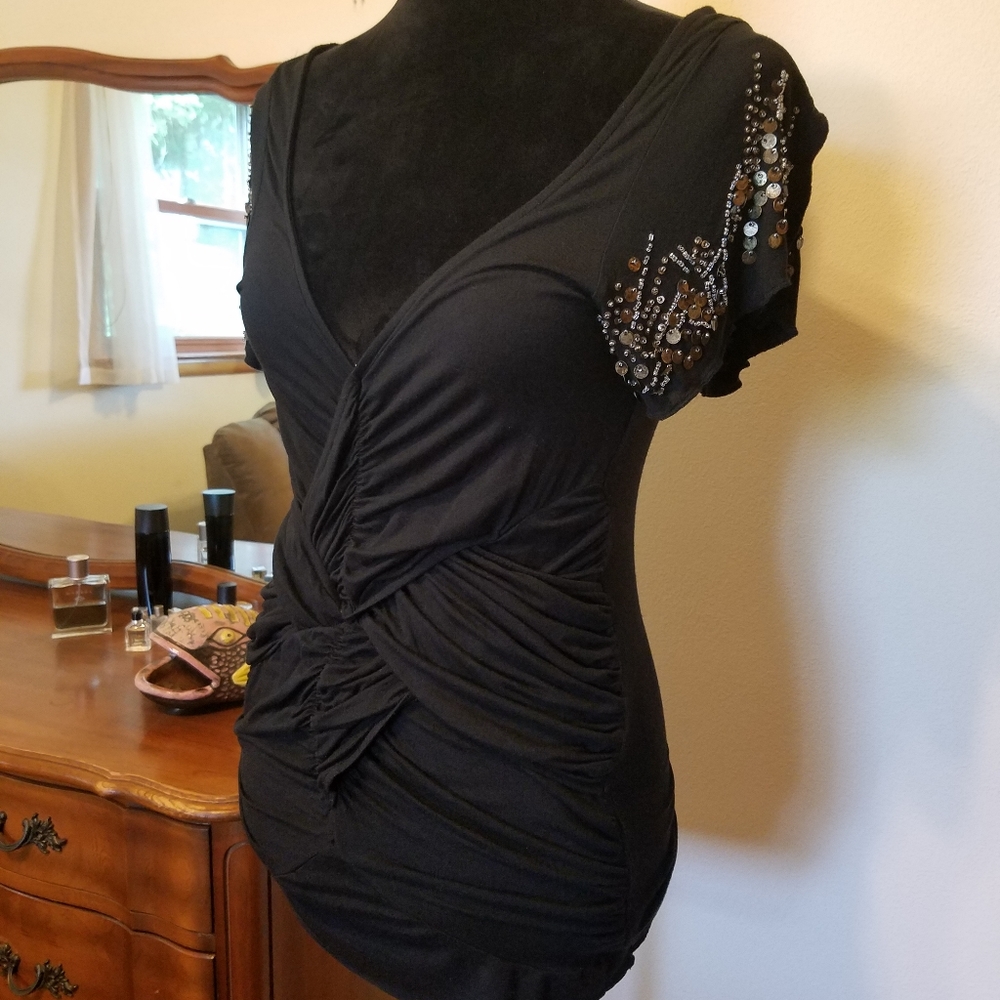 Free People black sequin punk rocker low shoulder twist shirt